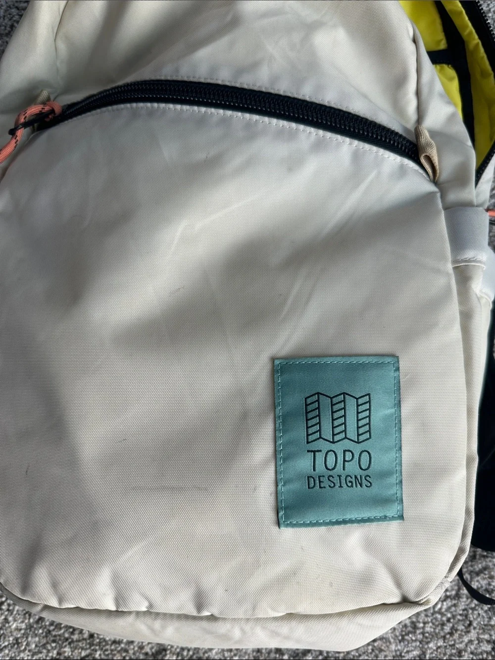 Topo Designs Cream Backpack with Teal Logo Patch